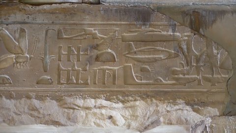 Mysterious symbols on the ceiling beam in the temple of Seti I in Abydos. Tank, Helicopter, Airplane and other vehicles. Egypt.
