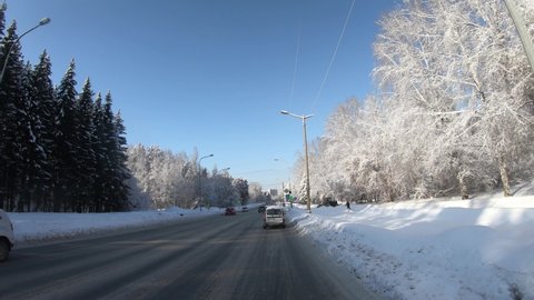 NOVOSIBIRSK, RUSSIA - FEBRUARY 12, 2020: Novosibirsk Academgorodok in winter. Turn from Academician Lavrentyev Avenue to Nikolaev Street. Novosibirsk, Siberia, Russia