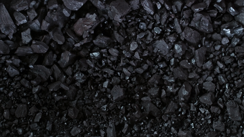 Super Slow Motion Shot of Crushing Coal on Black Background at 1000 fps. | Shutterstock HD Video #1066235491