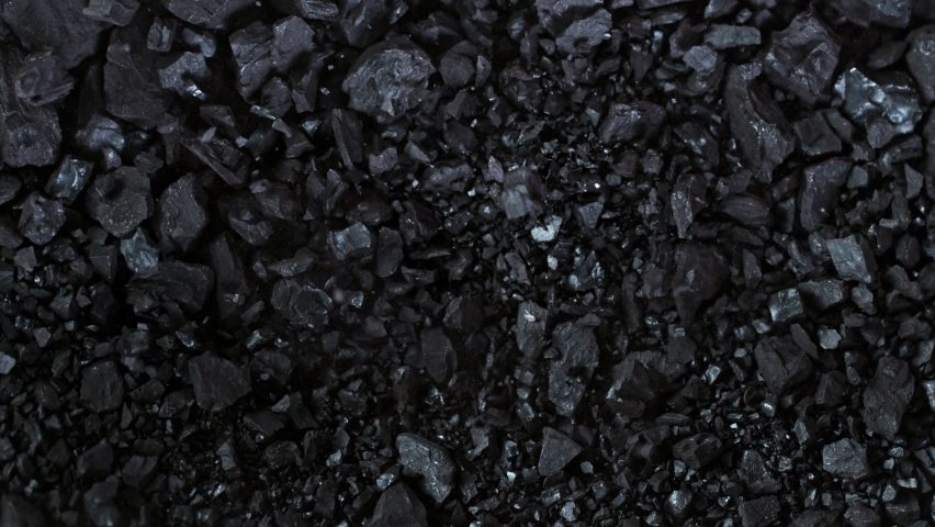 Super Slow Motion Shot of Crushing Coal on Black Background at 1000 fps. | Shutterstock HD Video #1066235491