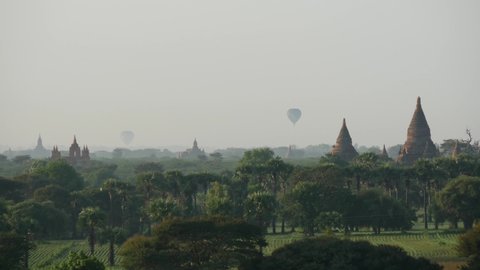 Balloon flying in the morning over the Pagodas in Bagan, Myanmar, Burma