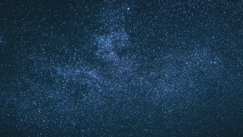 Blue Night Starry Sky With Glowing Stars. Bright Glow Of Sky Stars And Milky Way Galaxy. 4K. Natural Background Backdrop. | Shutterstock HD Video #1066261696