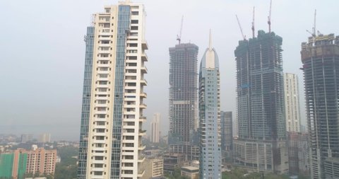 A drone shot of the Worli skyline with new buildings in construction.