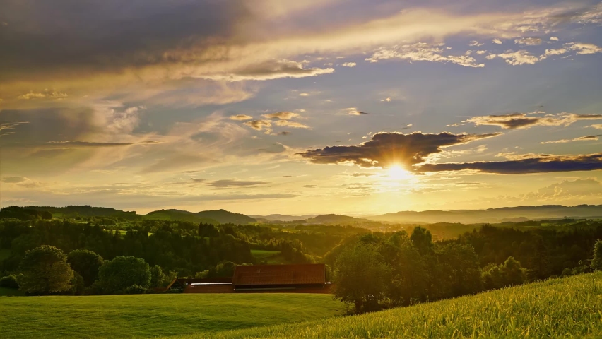 Time-lapse of Swiss mountain scenery at sunset, dramatic sky and mountain