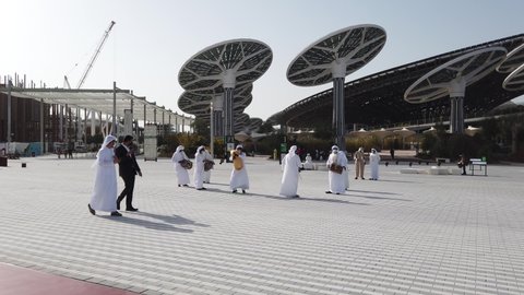 DUBAI, UAE - JANUARY, 2021: Entering Expo 2020, The Sustainability Pavilion. Emirati men music band playing traditional gulf music. 