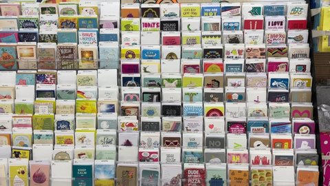 Edmonton, Canada - January 10, 2021: Greeting cards for various occasions on display on shelves in a store