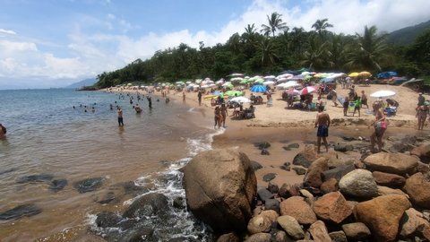 Ilhabela, São Paulo, Brazil - 01 13 2021: People on Feiticeira Beach 