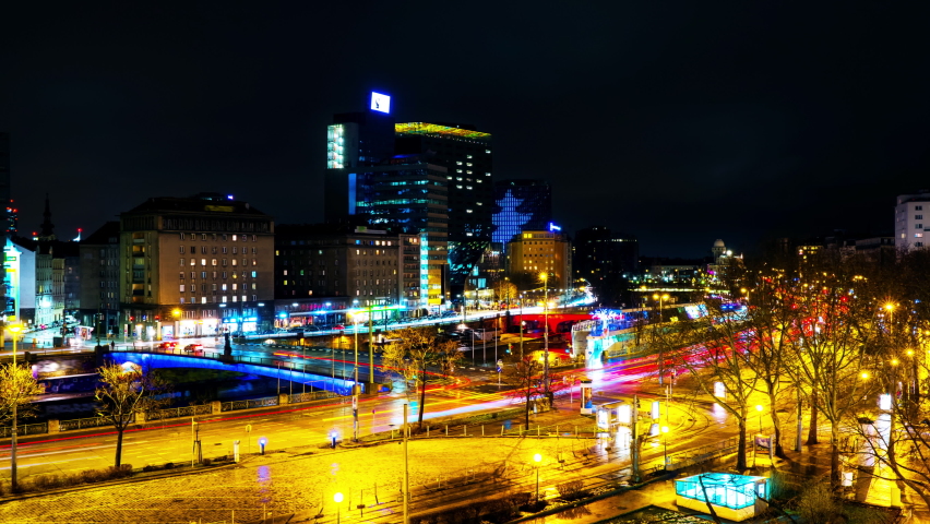 Vienna, Austria. Night timelapse in Schwedenplatz in central Vienna, Austria, with the view of the Donau, business buildings | Shutterstock HD Video #1066323505