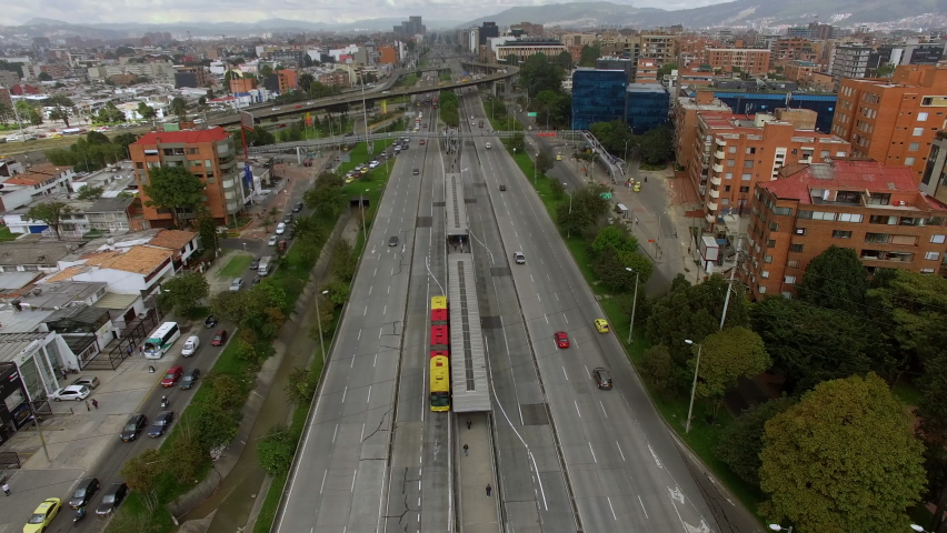 Aerial view of traffic on major intersection in Bogota, the capital and largest city of Colombia, South America. Urban infrastructure, transportation and development concept.