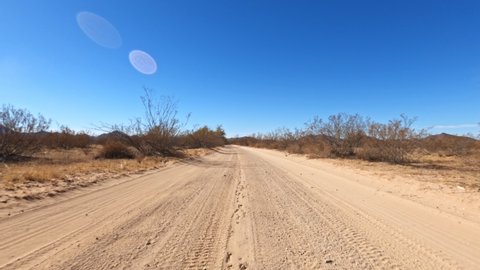 Desert road in rural Arizona sped up footage hyperlapse from front POV