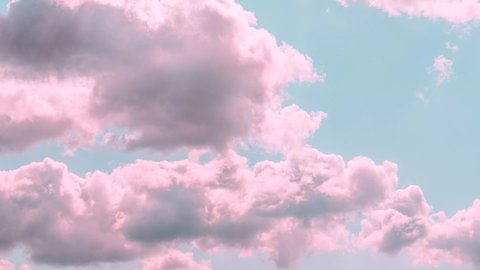 Motions clouds. Puffy fluffy beautiful pink clouds on turquise sky time lapse. Slow moving clouds. Live wallpaper concept for mobiles