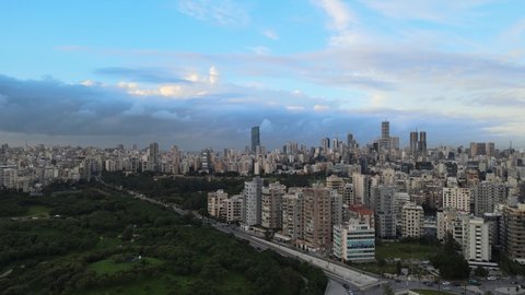 Drone Shot - Fly over Beirut showing east beirut and ending with Beirut Central Park