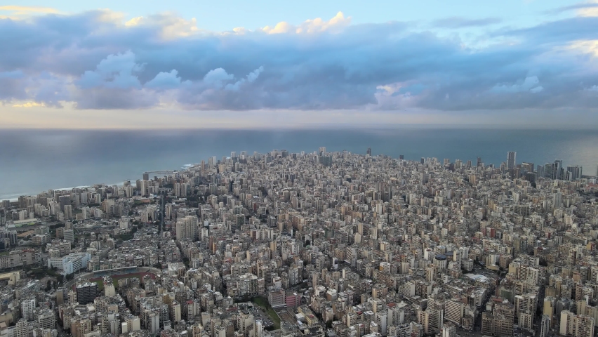 Drone Shot - Fly over Beirut showing east beirut and ending with Beirut Central Park Royalty-Free Stock Footage #1066370647