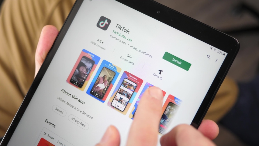 downloading uber app on tablet screen Stock Footage Video (100 