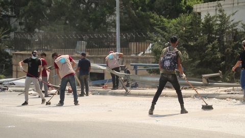 Beirut, Lebanon -  August 5th, 2020: Volunteers help and clean roads because of the explosion port of Beirut in the 4th of august