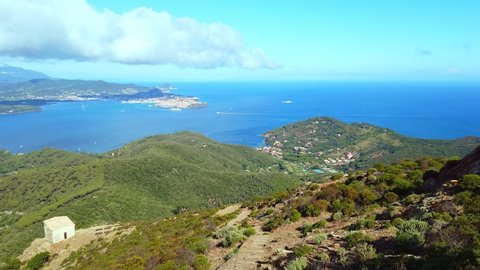 Panoramic view of Portoferraio Gulf, Elba Island, from top of Monte Volterraio on which the fortress dominates north part of island of Tuscany Archipelago, Italy. Church of San Leonardo on background.