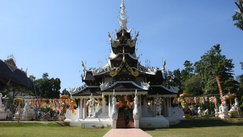 Ancient ruins building ubosot ordination hall for thai people and foreign travelers travel visit respect praying in Wat Pa Daraphirom Temple at Mae Rim city on December 2, 2020 in Chiang Mai, Thailand