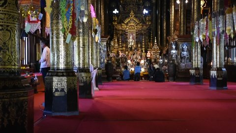 Interior decorator design ubosot ordination hall for thai people and foreign travelers travel visit respect praying in Wat Pa Daraphirom Temple at Mae Rim on December 2, 2020 in Chiang Mai, Thailand