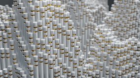 Abstract white metal cylinders with gold. looped video background. 3d render of big data. technology concept. futuristic ripple 