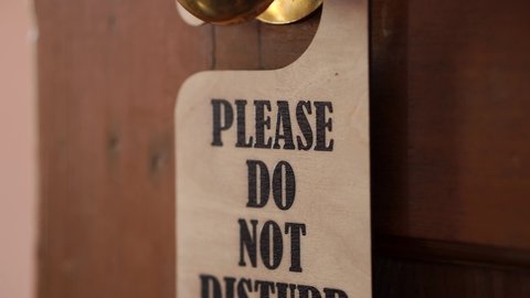 'Do Not Disturb' Sign Hanging From Outside Room, 4K