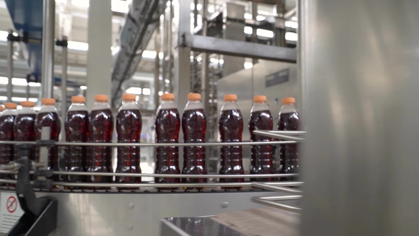 conveyor with drinks in the factory