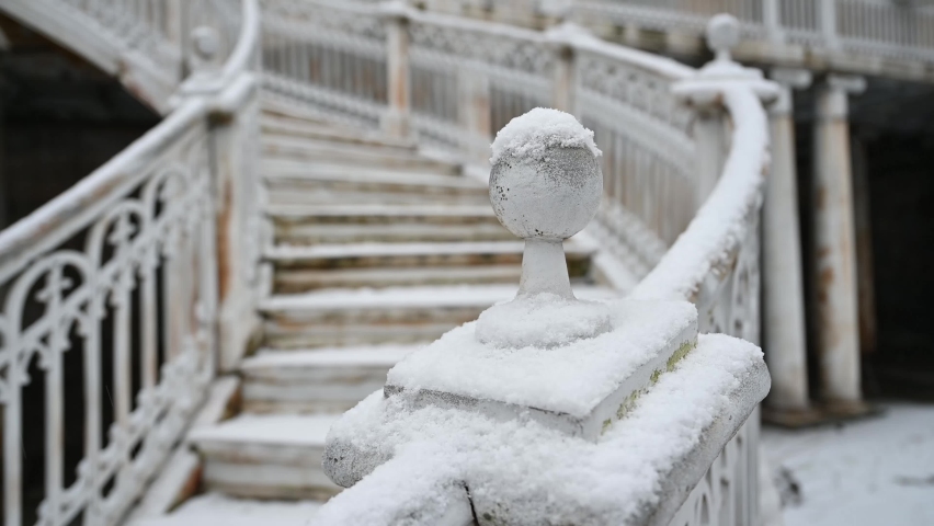 Saint Petersburg, Russia, a historical landmark an example of architecture - an architectural monument of the 18th century - a white staircase in the snow, winter.