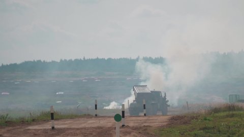 Automobile multiple launch rocket system Grad fires. Shooting from a long distance.