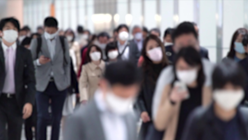 Covid-19 : Crowd of people wearing masks walking to work Royalty-Free Stock Footage #1066465372