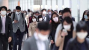 Covid-19 : Crowd of people wearing masks walking to work - Powered by Shutterstock - Get 15% off with code: PIKWIZARD15