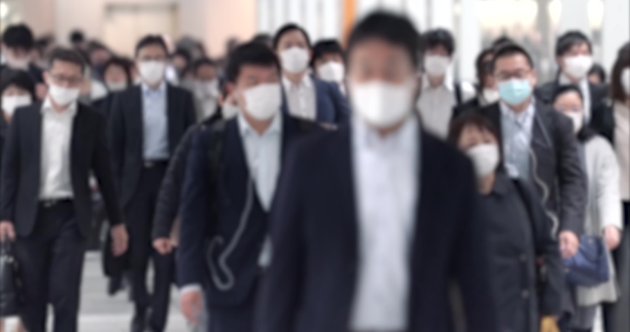 Covid-19 : Crowd of people wearing masks walking to work Royalty-Free Stock Footage #1066465408