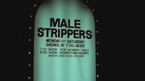 SAN FRANCISCO, USA MAY 1979: Male strippers sign in 70's