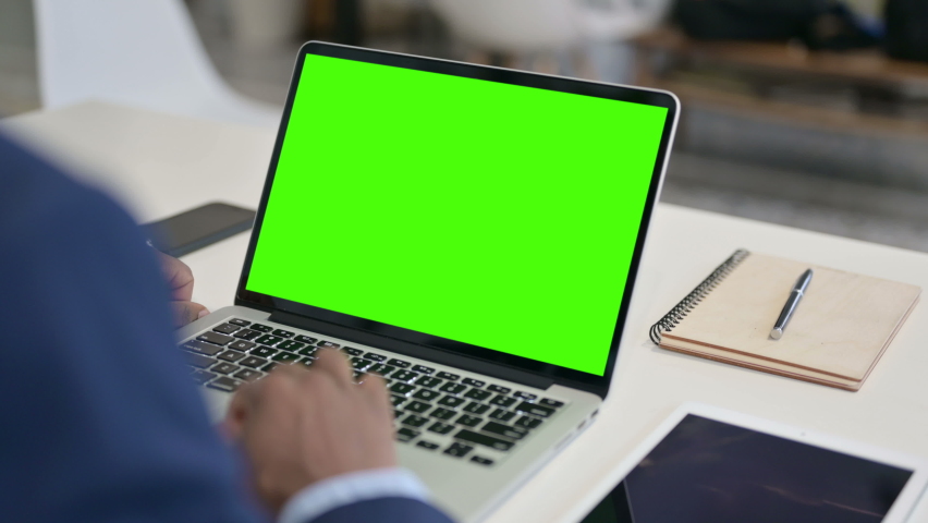 Businessman using Laptop with Green Chroma Key Screen | Shutterstock HD Video #1066475623