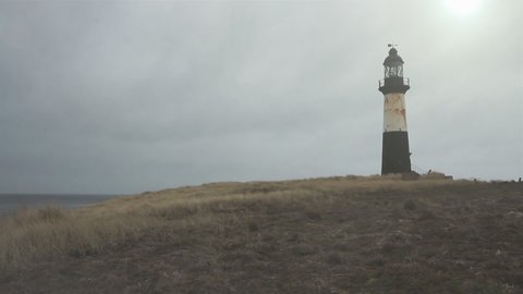 Cape Pembroke Lighthouse on Foggy Day, Falkland Islands (Islas Malvinas).  