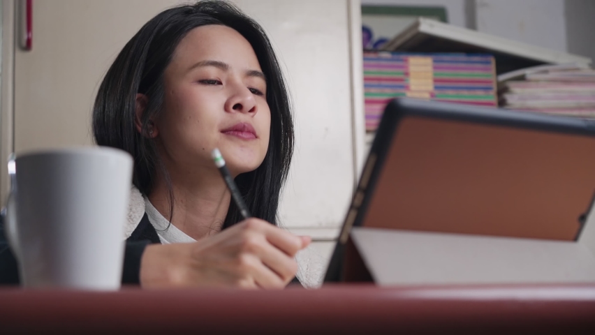 Naughty Asian office girl entertains the office