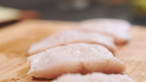 Salting of perch fillet, slow motion.