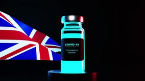 United Kingdom to launch COVID-19 vaccination campaign. European union flag and vaccin bottle. 3d Animation. Covid concept. Flag waving in wind. Black background - Powered by Shutterstock - Get 15% off with code: PIKWIZARD15