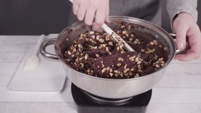 Time lapse. Step by step. Melting chocolate chips in the cooking pot to make macadamia nut fudge.