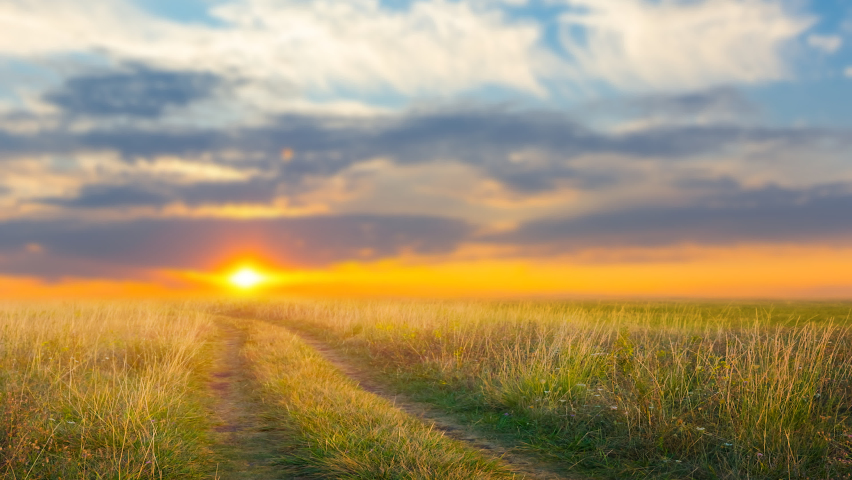 wide prairie at the sunset, evening outdoor time lapse scene