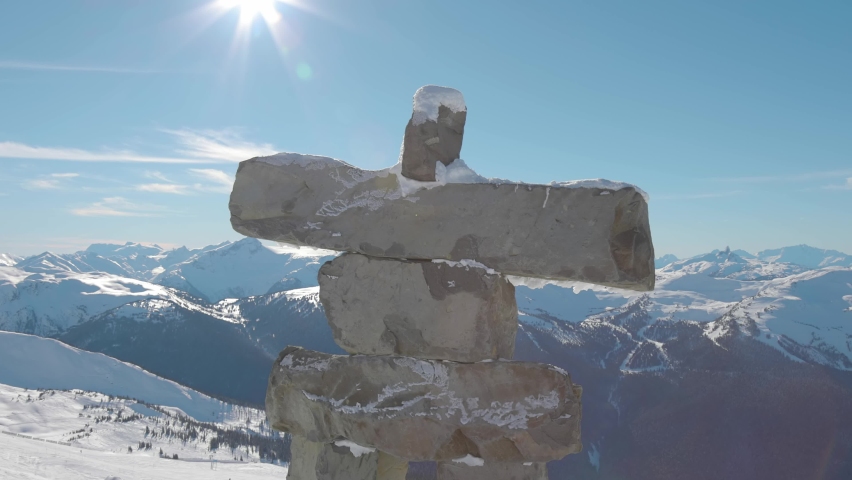 Whistler, British Columbia, Canada. Beautiful View of Statue on top of Blackcomb Mountain with the Canadian Snow Covered Landscape in background during a cloudy and vibrant winter day.