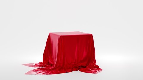 Realistic 3d box, cube covered with red silk cloth isolated on white background. Secret gift, hidden under satin fabric with drapery and folds. Blank podium, stand with tablecloth to show magic tricks