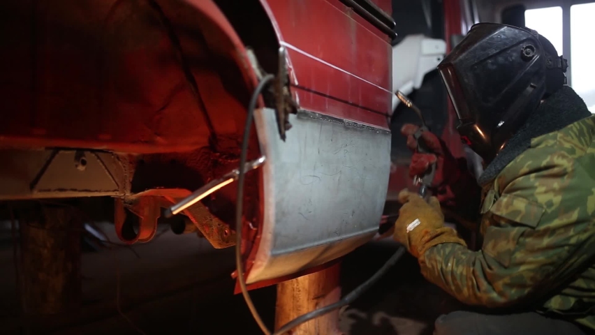 Car body repair, truck welding. | Shutterstock HD Video #1066566496