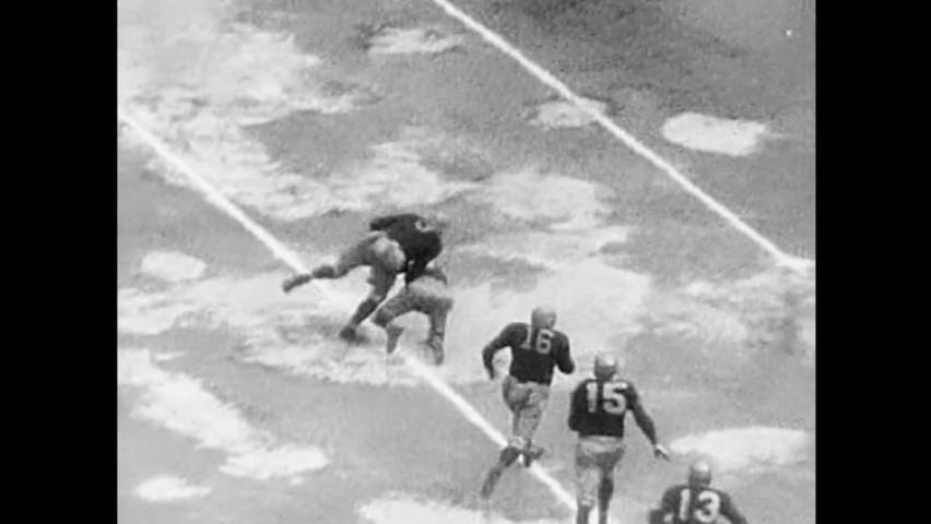 CIRCA 1930s - The Washington Redskins and Chicago Bears compete in the football Grid Championships in 1937. | Shutterstock HD Video #1066569817