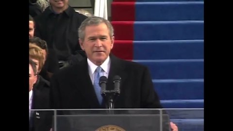 CIRCA 2000s - President Bush welcomes guests at his inaugural address of 2005.