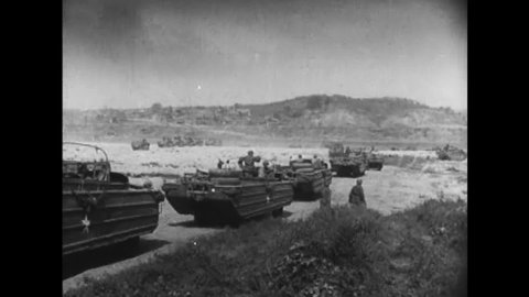 CIRCA 1951 - General Almond commanding, soldiers crossing a river, capturing South Mountain, entering Seoul and meeting friendly troops are all shown.