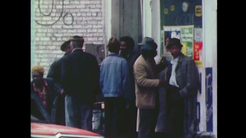 CIRCA 1970s - Various activities of people living an impoverished neighborhood in Oakland in 1974.