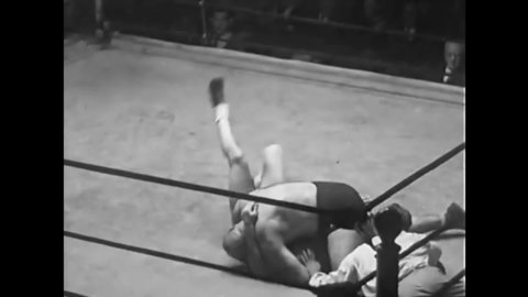CIRCA 1930s - A wrestling match takes place at St. Nicholas Arena in New York City in 1935.