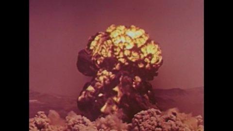 CIRCA 1961 - Scenes from a nuclear explosion, and an explanation of initial and residual nuclear fallout.