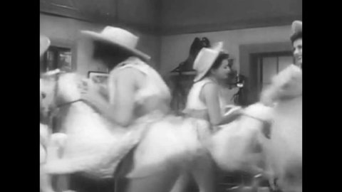 CIRCA 1940s - Humorous Western ballad soundie featuring women dancing as mock horses in a roundup circa 1940s.