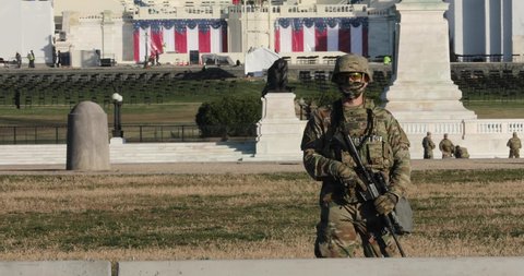 Washington, DC, USA - Jan. 14, 2021: Security is ramped up ahead of the inauguration of President-Elect Joe Biden. Fences are installed along the National Mall and the National Guard is brought in.