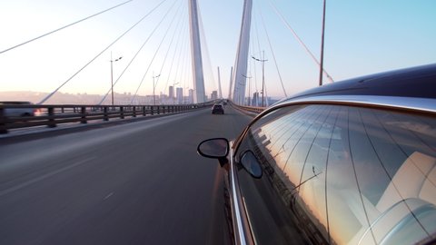 View from a black fancy car. Driving along the Golden bridge. Vladivostok, Russia